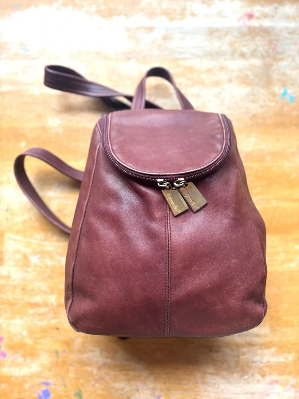 Tiganello Smooth Leather Backpack in Dark Brown with Gold Accent